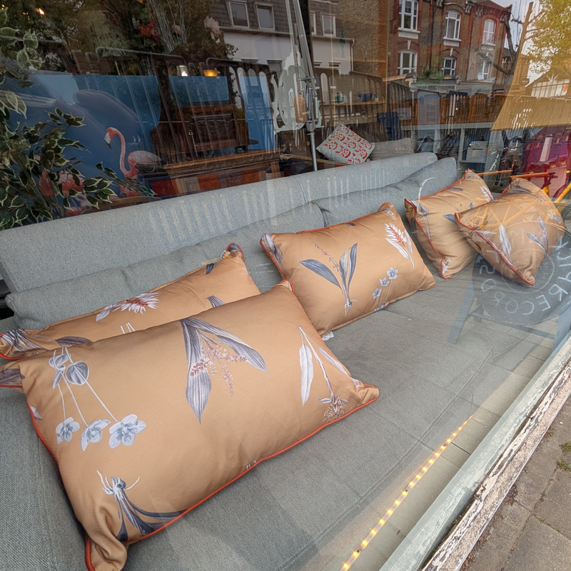 Ochre Botanical Print Cushions with Terracotta Piping.
